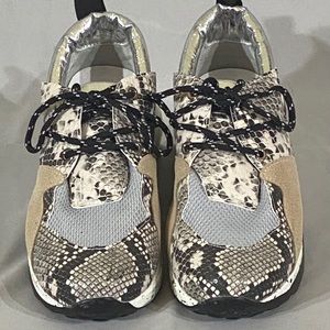 Outwood’s tennis shoes